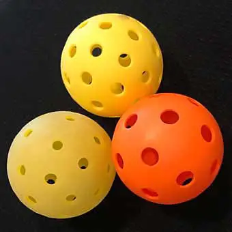 Three Pickleball balls